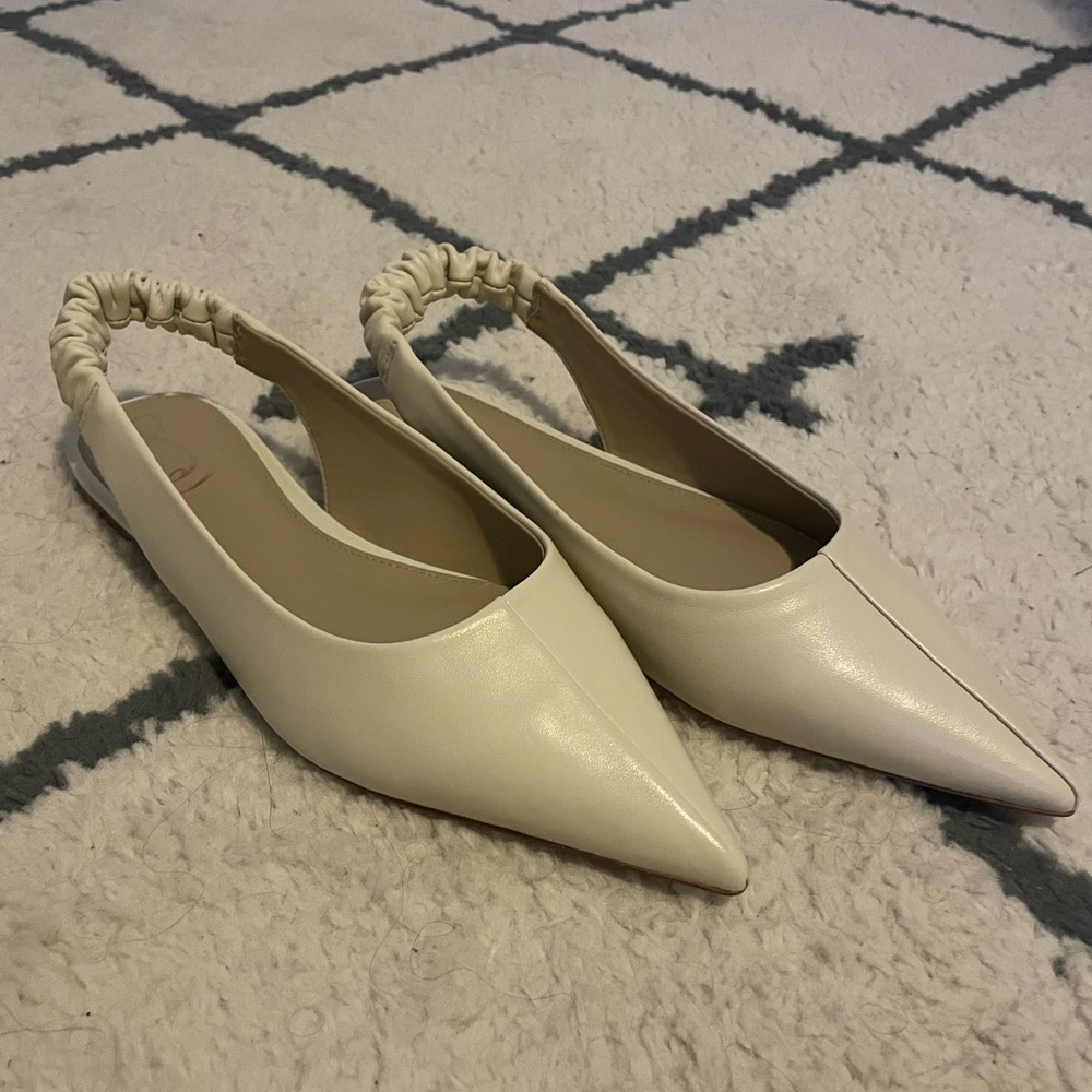White pointed flats